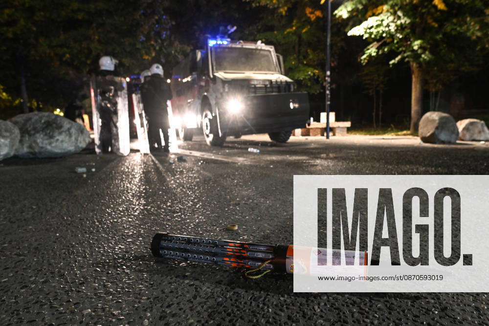 Mass Anti-Government National Protest in Tirana TIRANA, ALBANIA - OCTOBER 24: Unused pyrotechnic firework rockets lie scattered on the asphalt pavement near an advancing armored police vehicle and riot squad at night on October 24, 2026, in Tirana, Albania. Unrest and physical confrontations erupt in Tirana city center as demonstrators and riot police clash during a massive nationwide protest, turning the capital s main avenue into a major flashpoint as chaotic skirmishes broke out between security forces and factions of the crowd. Artur Widak Anadolu Tirana Albania. Editorial use only. Please get in touch for any other usage.