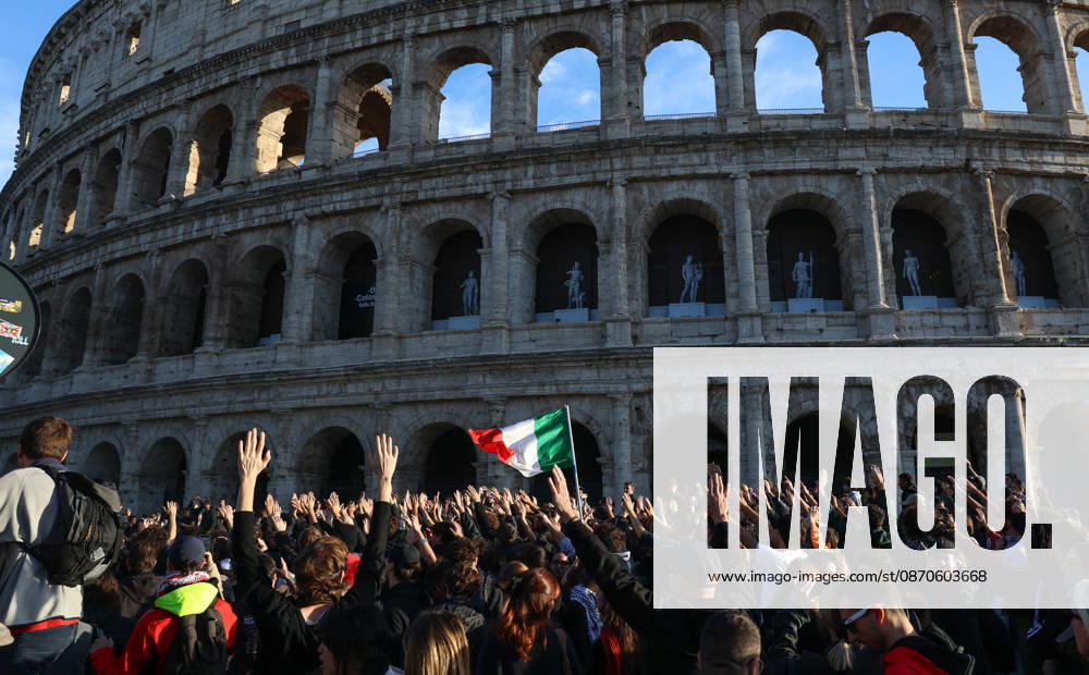 (261024) -- ROME, Oct. 24, 2026 -- Demonstrators march past the Colosseum during an anti-war march in Rome, Italy, Oct. 24, 2026. Protests over rising living costs, military expansion and increased arms spending swept across several Italian cities on Saturday, with clashes between demonstrators and police reported in multiple locations. In Rome, demonstrators set off from Piazza della Repubblica, according to the ANSA news agency. Clashes erupted between protesters and police in the city center later in the evening, prompting police to use water cannons and tear gas in an attempt to disperse the crowds. ) ITALY-ROME-PROTESTS WangxKaiyan