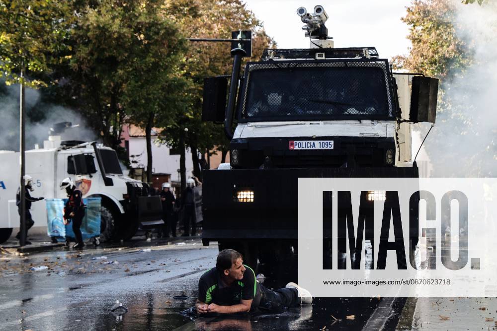 TIRANA, ALBANIA, OCTOBER 24, 2026: Demonstrators clash with riot police during an anti-government protest in central Tirana. Protesters throw stones, pyrotechnics and petrol bombs, while police use tear gas, water cannons and rubber bullets. The demonstrations call for Prime Minister Edi Ramas resignation, increased support for education and greater political accountability. Tirana Albania - ZUMAq101 20261024_zna_q101_370