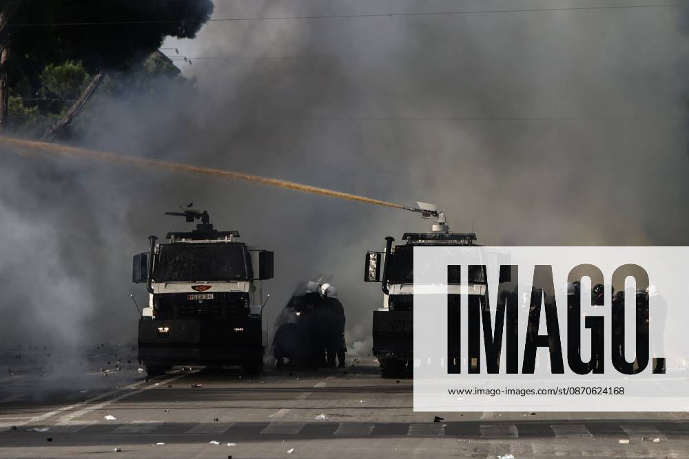 TIRANA, ALBANIA, OCTOBER 24, 2026: Demonstrators clash with riot police during an anti-government protest in central Tirana. Protesters throw stones, pyrotechnics and petrol bombs, while police use tear gas, water cannons and rubber bullets. The demonstrations call for Prime Minister Edi Ramas resignation, increased support for education and greater political accountability. Tirana Albania - ZUMAq101 20261024_zna_q101_357