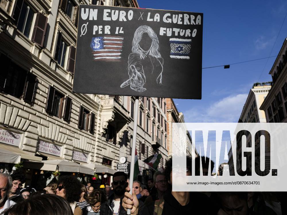 Rome Anti War Protest A demonstrator holds a sign reading One euro for war, zero for the future during an anti-war protest in Rome, Italy on October 24, 2026. Demonstrators took part in an anti-war march under the slogan Keep Italy Out of the War . Protesters further voiced opposition to Italy s involvement in armed conflicts, military rearmament and government policies. Rome Lazio Italy