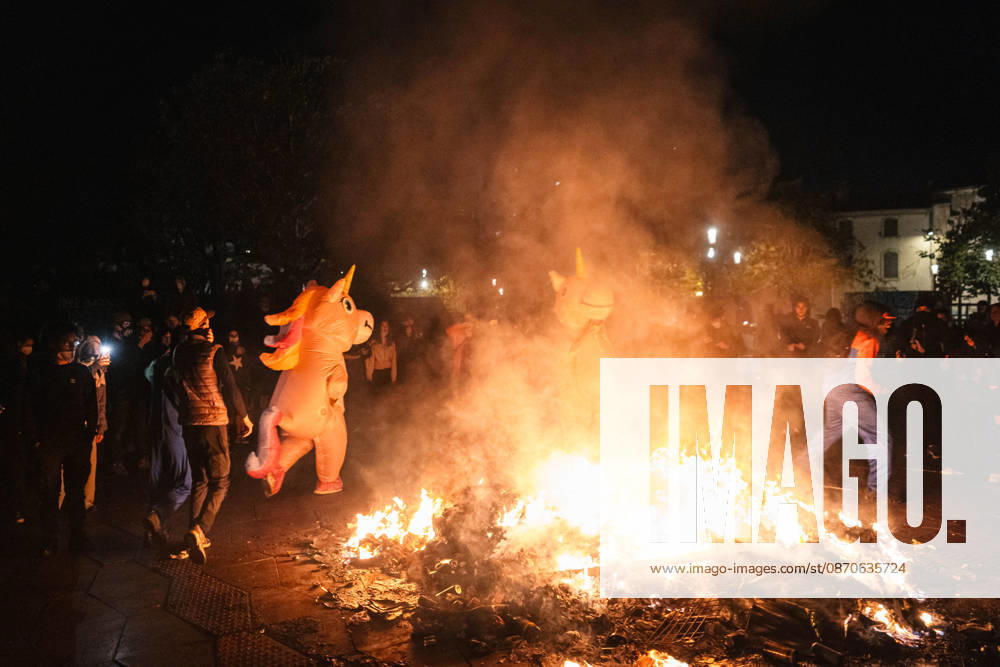 Marseille France Street Protests Demonstrators walk near a fire during a protest in Marseille, France on October 24, 2026. Authorities deployed around 70,000 security personnel across France for renewed protests over the cost of living, after unrest a week earlier saw public buildings damaged, hundreds of shops looted and about 2,700 people arrested. Marseille Provence-Alpes-CÃ te France