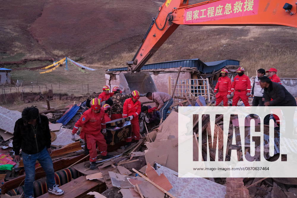 Rescuers help affected residents search for property and valuables following a 7.0-magnitude earthquake on October 24, 2026 in Baqen County, Maru Township, Nagqu City, Xizang Autonomous Region of China. Rescue and relief efforts continue after a 7.0-magnitude earthquake struck Baqen County of the city of Nagqu in southwest China s Xizang Autonomous Region, local authorities said on October 24. The earthquake, which struck at 10:33 p.m. on October 22, has left 16 people dead and 76 others injured.