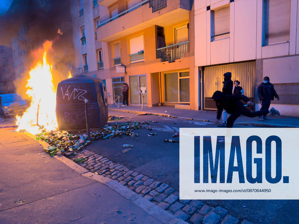 Lyon France Protests October 24 A demonstrator throws an object during a protest in Lyon, France on October 24, 2026. Authorities deployed around 70,000 security personnel across France for renewed protests over the cost of living, after unrest a week earlier saw public buildings damaged, hundreds of shops looted and about 2,700 people arrested. Lyon Rhone Alpes France