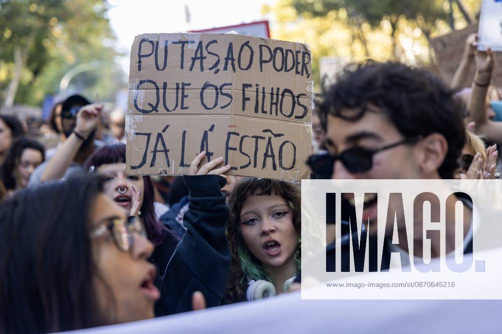 Protesters hold up signs and shout slogans during a protest for affordable housing and against the rising cost of living..Thousands of people protested for access to affordable housing and against the rising cost of living. The demonstration ended in Rossio Square, with protesters setting up tents as a symbol of the housing shortage in Portugal. Lisbon Portugal - ZUMAs197 20261024_aaa_s197_193