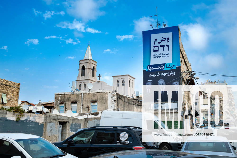 2026 Elections in Israel: Haifa, October 24, 2026. A giant campaign poster for the United List, an alliance of Arab parties, stretched across the back of a house in the Wadi Nisnas neighborhood of Haifa, which is predominantly inhabited by Arab citizen