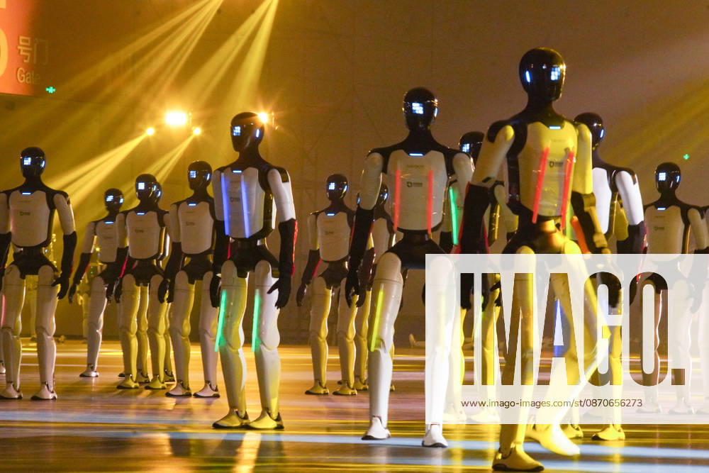 One hundred and ten domestic humanoid robots perform a synchronized dance to set the Guinness World Record for most robots dancing simultaneously at Jinan Yellow River International Convention and Exhibition Center on October 24, 2026 in Jinan, Shandong Province of China.