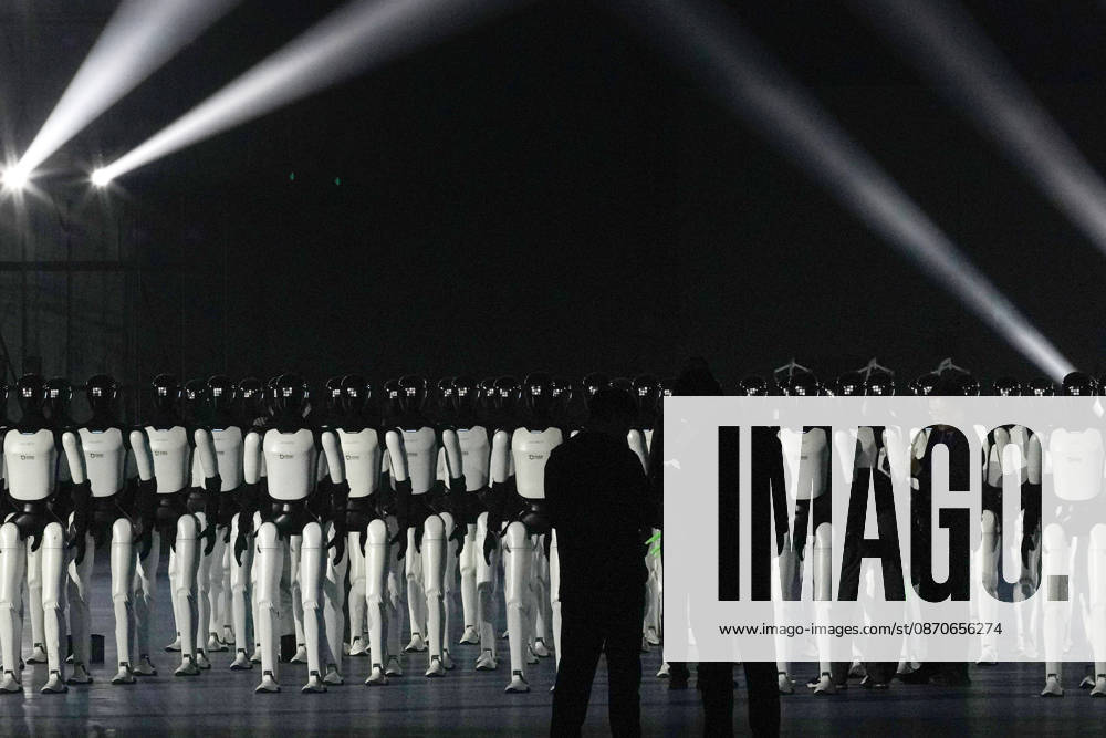 One hundred and ten domestic humanoid robots perform a synchronized dance to challenge for the Guinness World Record for most robots dancing simultaneously at Jinan Yellow River International Convention and Exhibition Center on October 24, 2026 in Jinan, Shandong Province of China.