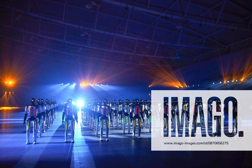 One hundred and ten domestic humanoid robots perform a synchronized dance to set the Guinness World Record for most robots dancing simultaneously at Jinan Huanghe International Convention and Exhibition Center on October 24, 2026 in Jinan, Shandong Province of China.