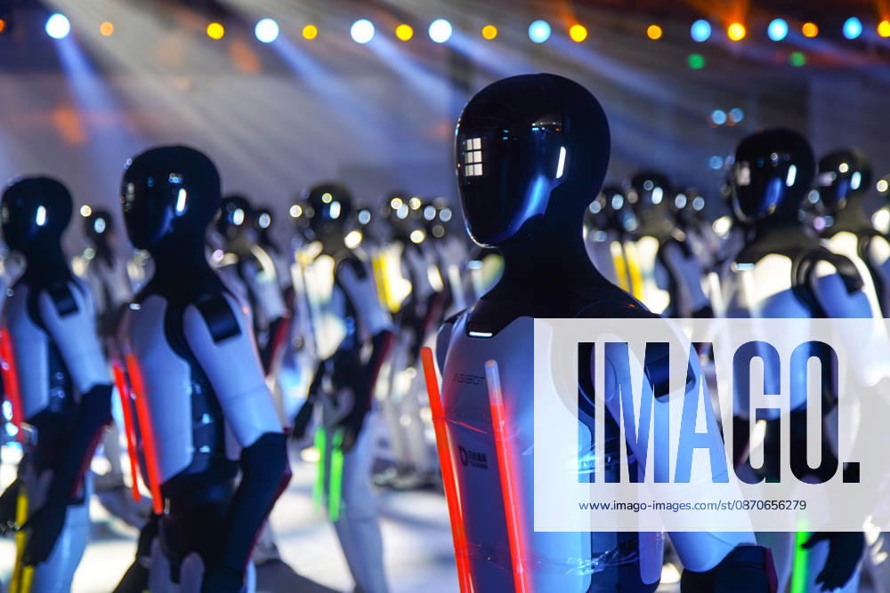 One hundred and ten domestic humanoid robots perform a simultaneous dance to challenge for the Guinness World Record for most robots dancing simultaneously at Jinan Huanghe International Convention and Exhibition Center on October 24, 2026 in Jinan, Shandong Province of China. The event was organized by AgileX Robotics.