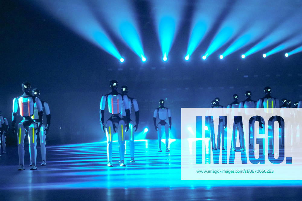 One hundred and ten domestic humanoid robots perform a synchronized dance to attempt the Guinness World Record for most robots dancing simultaneously at Jinan Huanghe International Convention and Exhibition Center on October 24, 2026 in Jinan, Shandong Province of China.