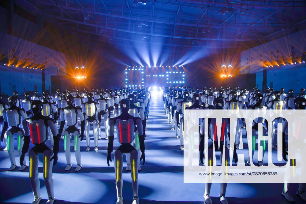 One hundred and ten domestic humanoid robots perform a synchronized dance to challenge for the Guinness World Record for most humanoid robots dancing simultaneously at the Yellow River International Convention and Exhibition Center on October 24, 2026 in Jinan, Shandong Province of China.