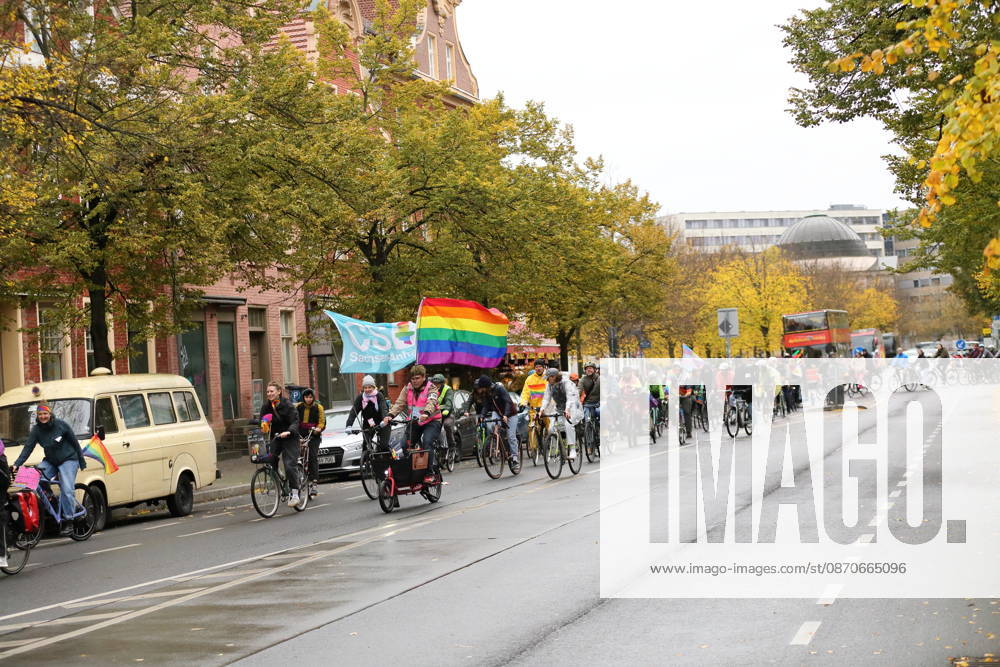 Protesters ride with a rainbow flag on Charlottenstraße during Bike Pride in Potsdam, October 24, 2026 Bike Pride Potsdam