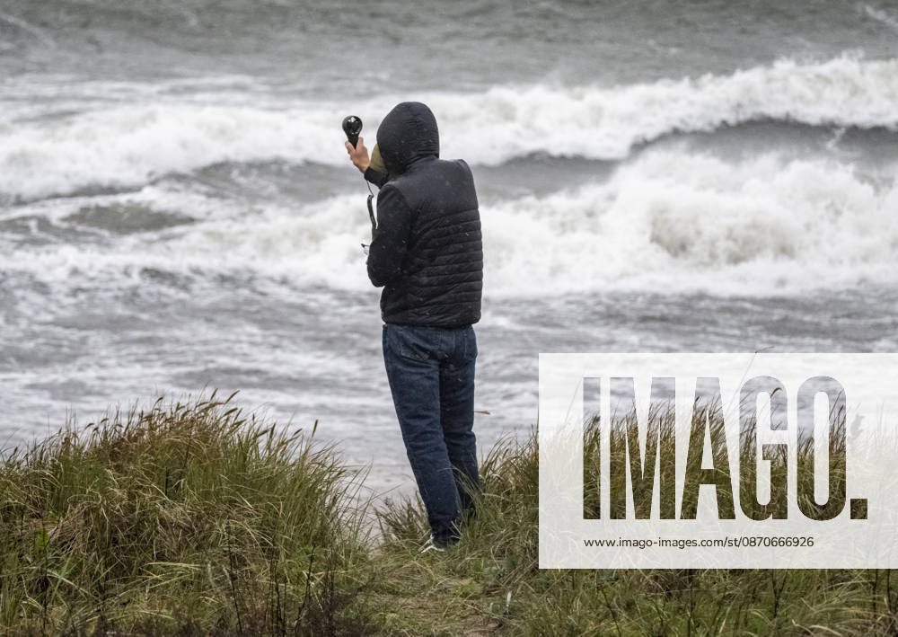 A man holds up an anemometer showing 22–23 m s in gusts on the beach outside Ystad. High waves and rain lashed the coast as Storm Boelo swept across southern Sweden on Sunday. YSTAD SSWEDEN