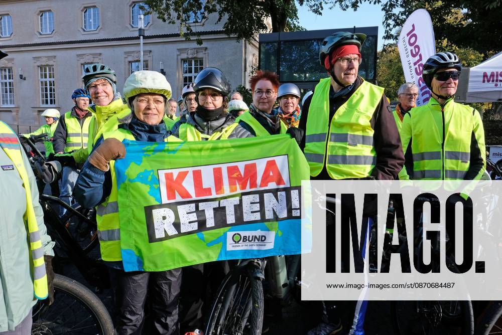 Participants carrying a BUND banner reading Save the Climate, Aachen, October 25, 2026: Start of the Road2COP31 Aachen–Antalya bike ride—shifting into high gear for climate justice from Aachen to Passau. An initiative by Misereor in collaboration with the COP 31 Ride network, Clim