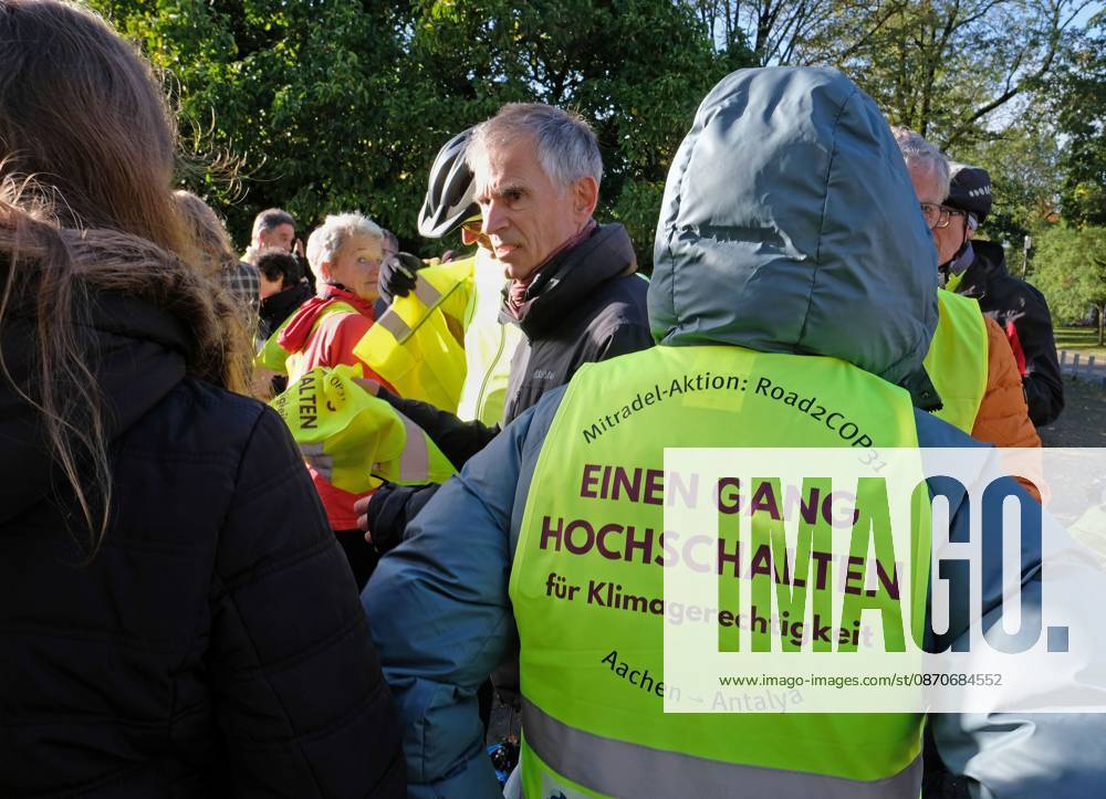 Participants wearing safety vests in Aachen, October 25, 2026: Start of the Road2COP31 Aachen-Antalya bike ride—shifting into high gear for climate justice from Aachen to Passau. An initiative by Misereor in collaboration with the COP 31 Ride network, Climate Alliance, One Earth Ecumenical N