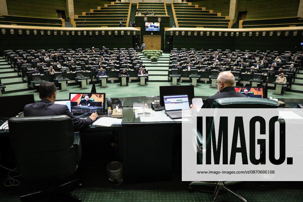 A rear view of the chamber shows Mohammad Bagher Ghalibaf seated at the front desk overlooking many largely empty green benches at the Islamic Consultative Assembly in Tehran, Iran, on October 25, 2026. Speaker Mohammad Bagher Ghalibaf chaired the October 25 session, which combined physical attendance at the Islamic Consultative Assembly with participation by video link. Tehran Iran - ZUMAi98_ 20261025_zih_i98_103