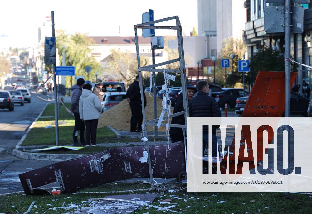 Russia Ukraine Drone Attack 9273025 25.10.2026 People stand outside a residential building damaged in a massive drone attack amid Russia s military operation in Ukraine, in Belgorod, Russia. Two persons were killed and 14 others were injured in a reported strike by the Ukrainian Armed Forces on October 25. Taisia Liskovets Sputnik Belgorod Russia