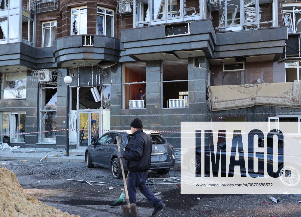 Russia Ukraine Drone Attack 9273031 25.10.2026 A man clears debris outside a residential building damaged in a massive drone attack amid Russia s military operation in Ukraine, in Belgorod, Russia. Two persons were killed and 14 others were injured in a reported strike by the Ukrainian Armed Forces on October 25. Taisia Liskovets Sputnik Belgorod Russia