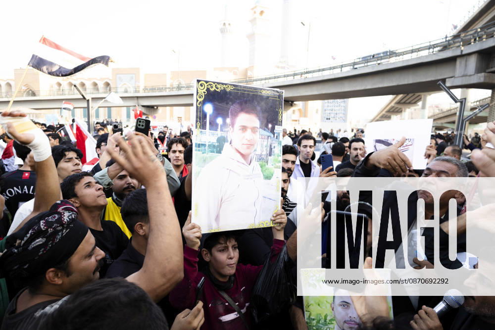 Najaf Iraq October Protest A child holds a portrait during a demonstration in Najaf, Iraq on October 25, 2026. The protest marked the seventh anniversary of the October 2019 protest movement, with participants calling for political reform, anti-corruption measures, improved public services and more jobs. Najaf Najaf Iraq