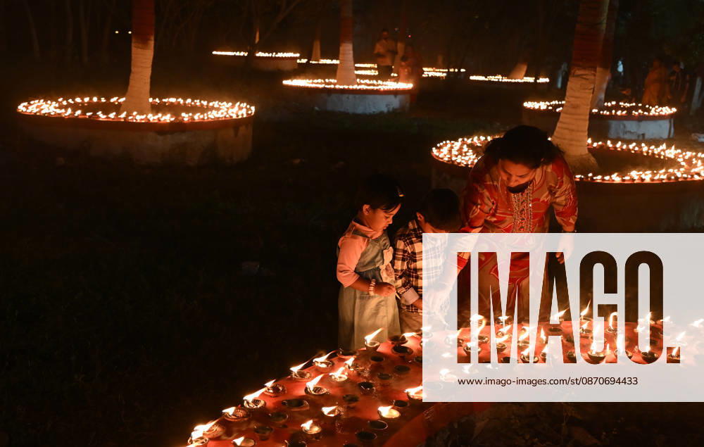 Sharad Purnima (full moon) celebration in Mumbai, India - 25 Oct 2026 A woman (R) helps her children to light earthen lamp on the occasion of Sharad Purnima (full moon) celebration in Mumbai. Sharad Purnima, also known as the Full Moon Festival, marks the end of the monsoon season. devotees observe fasting and meditate on the full moon night, Goddess Lakshmi, the deity of wealth, is worshipped on this day as it is believed to be her birthday. praying to her is said to bring good luck and prosperity in the life of devotees. Mumbai India