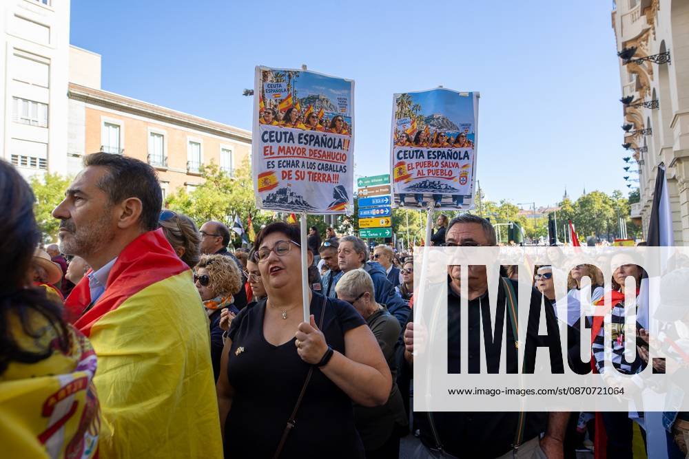 A march demanding solutions and a restoration of social normalcy in Ceuta - Madrid, Spain - 25 Oct 2026 Protesters carry signs in support of the autonomous city of Ceuta. Thousands of people in Madrid have rallied in support of the demands made by women from Ceuta—known locally as caballas —who are calling for a return to normalcy in the autonomous city. Madrid Spain