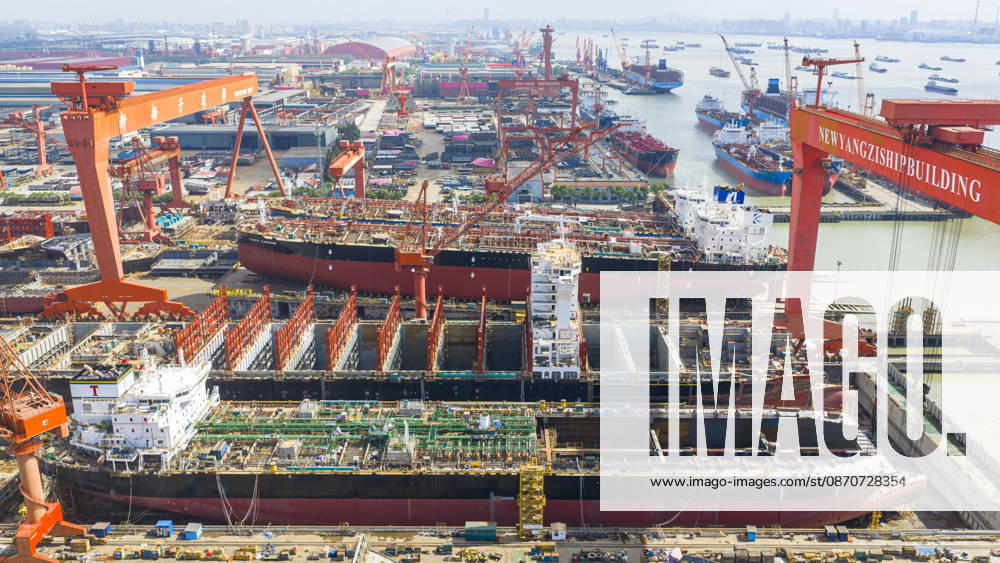 Shipbuilding TAIZHOU, CHINA - OCTOBER 25, 2026 - Multiple large vessels are under construction at Jiangsu New Yangtze Shipbuilding Co., Ltd. in Taizhou, Jiangsu Province, China on October 25, 2026. Taizhou Jiangsu China