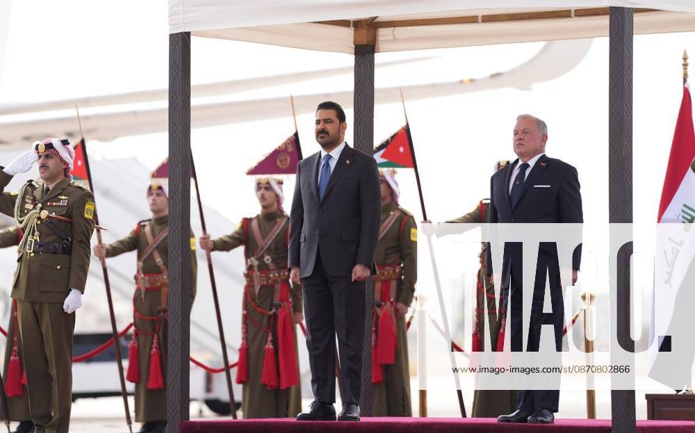 Iraqi Prime Minister Ali Falih al-Zaidi in Jordan AMMAN, JORDAN - OCTOBER 26 : (---- - MANDATORY CREDIT - IRAQI PRIME MINISTER S OFFICE PRESS HANDOUT - NO MARKETING NO ADVERTISING CAMPAIGNS - DISTRIBUTED AS A SERVICE TO CLIENTS----) Iraqi Prime Minister Ali Falih al-Zaidi is welcomed with an official ceremony by King Abdullah II at Marka Military Airport during his official visit to Amman, Jordan, on October 26. Iraqi Prime Minister s Office Press Handout Anadolu Amman Jordan. Editorial use only. Please get in touch for any other usage.