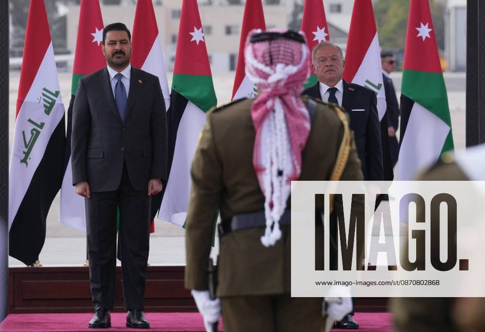 Iraqi Prime Minister Ali Falih al-Zaidi in Jordan AMMAN, JORDAN - OCTOBER 26 : (---- - MANDATORY CREDIT - IRAQI PRIME MINISTER S OFFICE PRESS HANDOUT - NO MARKETING NO ADVERTISING CAMPAIGNS - DISTRIBUTED AS A SERVICE TO CLIENTS----) Iraqi Prime Minister Ali Falih al-Zaidi is welcomed with an official ceremony by King Abdullah II at Marka Military Airport during his official visit to Amman, Jordan, on October 26. Iraqi Prime Minister s Office Press Handout Anadolu Amman Jordan. Editorial use only. Please get in touch for any other usage.