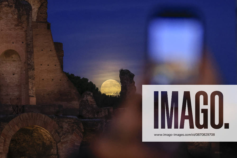 Full moon rising in Rome ROME, ITALY, OCTOBER 26: A tourist takes pictures to tthe full moon as it rises behind the Palatine hill in Rome, Italy, on October 26, 2026. Riccardo De Luca Anadolu Rome Italy. Editorial use only. Please get in touch for any other usage.