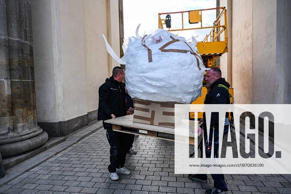 New Lighting for the Brandenburg Gate ** ** **New Lighting for the Brandenburg Gate, Berlin’s most famous landmark is getting a nighttime makeover; the usual lighting will be turned off and the moonlight —a glowing sphere in the central archway—will be turned on, photographe