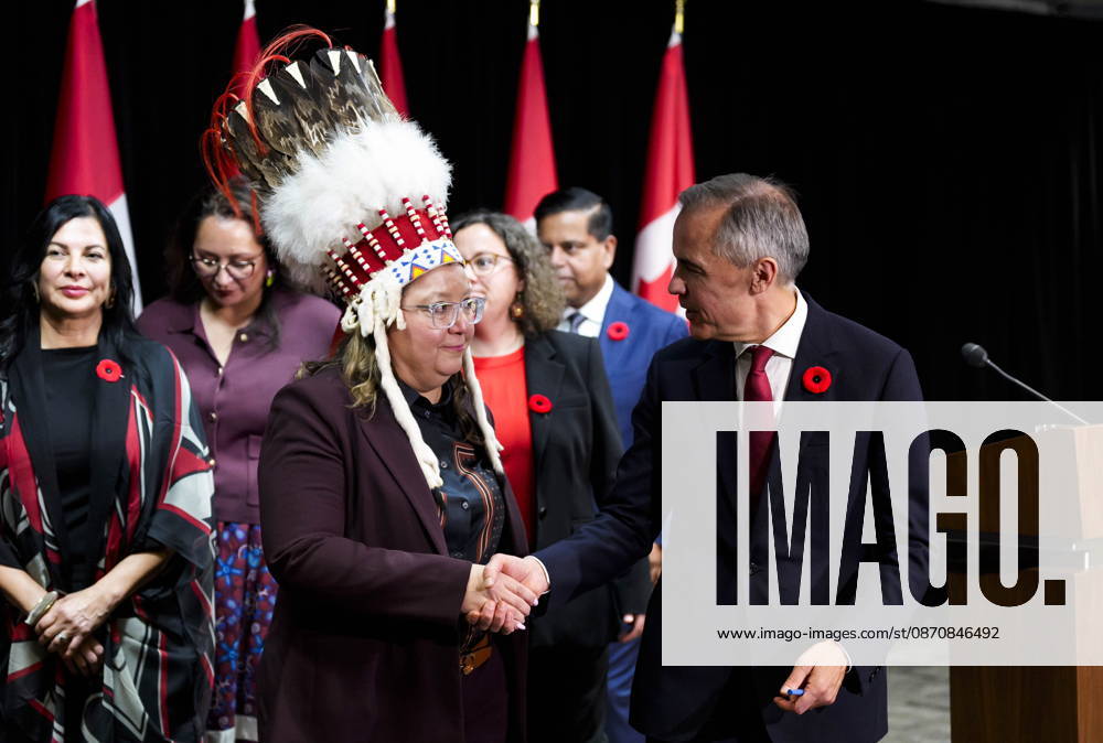 Prime Minister Mark Carney shakes hands with Assembly of First Nations National Chief Cindy Woodhouse Nepinak after a news conference at the conclusion of a First Nations and First Ministers meeting in Ottawa, on Monday, Oct. 26, 2026. Ottawa Canada - ZUMAc35_ 20261026_zaf_c35_117