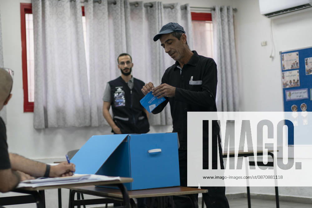 Israelis head to the polls in parliamentary elections UMM AL-FAHM, ISRAEL - OCTOBER 27: Voters cast their ballots at Al-Aqwas School as voting began Tuesday in Israel s parliamentary elections, with more than 7.3 million people eligible to cast ballots to elect the 120-member Knesset in the northern city of Umm al-Fahm, Israel on October 27, 2026. Polling stations opened at 7 am local time (0500GMT) and are scheduled to close at 10 pm (2000GMT), according to Israel’s Central Elections Committee. A total of 12,018 polling stations and approximately 18,000 ballot boxes have been prepared nationwide, with around 100,000 election workers deployed. Mostafa Alkharouf Anadolu Umm al-Fahm Israel. Editorial use only. Please get in touch for any ot