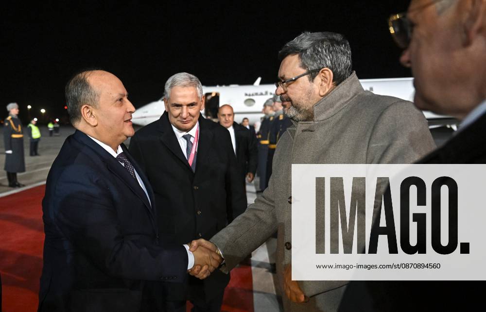 Prime Minister of Algeria Sifi Ghrieb arrives in Moscow 9274107 26.10.2026 Prime Minister of Algeria Sifi Ghrieb arrives in Moscow for the 3rd Russia-Africa Summit and Forum and the summit of the Gas Exporting Countries Forum (GECF). Second left: Algerian Ambassador to Russia Toufik Djouama. Sergey Bobylev Sputnik Crediting the source in the following order photographer s name 8th GECF summit host photo agency is mandatory when using the photo Moscow Russia