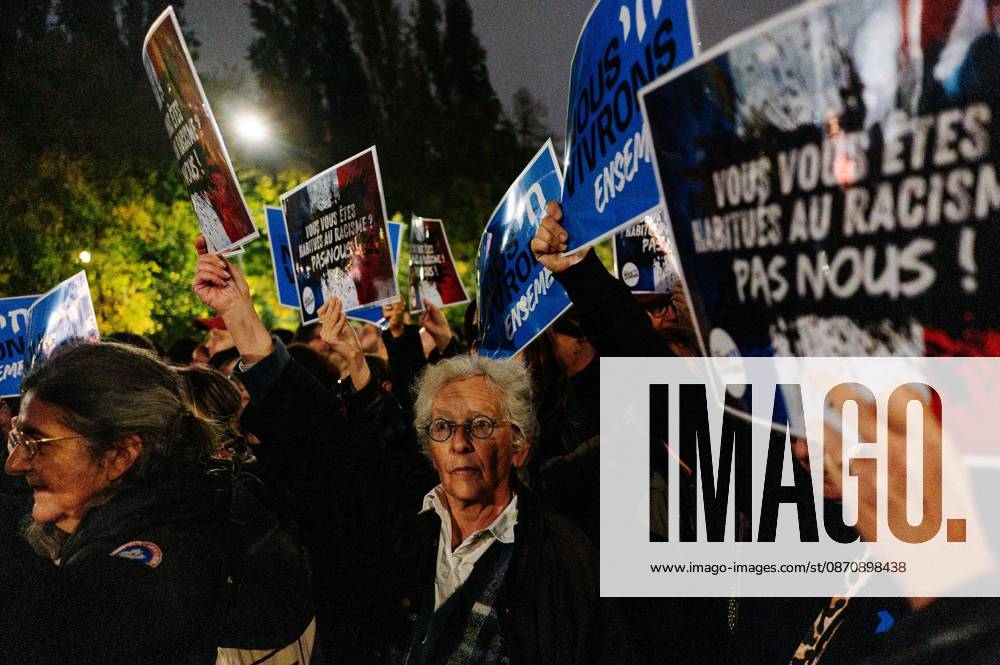 Anti-racism rally at Place Stalingrad, in Paris Jan Schmidt Whitley Le Pictorium Le Pictorium MAXPPP Paris October 26, 2026 The group Nous Vivrons with signs denouncing racism Several thousand people gathered at Stalingrad in Paris to denounce the murder of Pengo Bossio Wangi, 26, in Trappes, and more broadly the climate of racism rampant in France—including its alleged perpetrators such as certain television channels like CNews or media outlets in the Bolloré sphere. The crowd listened to numerous speakers from the traditional left. Broadcast restrictions: No Frontieres Media, Valeurs Actuelles out, no JDD, JDD out, RUSSIA OUT, NO RUSSIA norussia 10 26 2026 France Île-de-France Paris Jan Schmidt Whitley Le Pictorium Several thousand peo