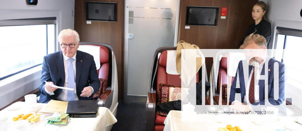 Federal President and China Railroad, October 26, 2026, China, Hefei, Presidential Flight Service, Departure: Federal President Frank Walter Steinmeier and Elke Buedenbender traveling to China via China Railroad from Hefei to Yixiang with Ambassador Ackermann, China Railroad staff, high-speed train, 330 km h, pictured here in conversation with Ambassador Ackermann, Hef