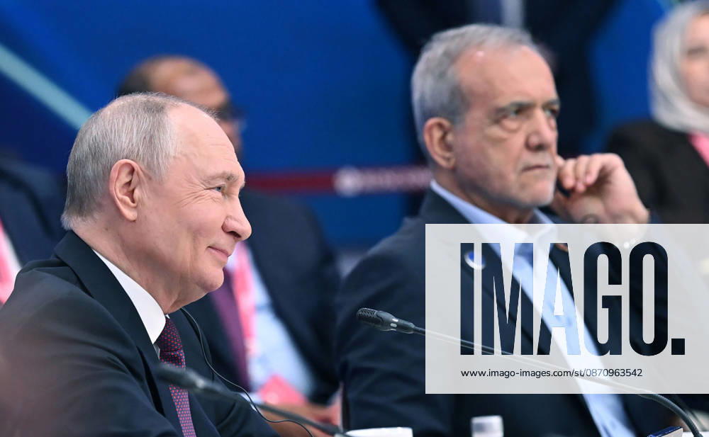 Russian President Vladimir Putin (L) and Iranian President Masoud Pezeshkian (R) attend the 8th Gas Exporting Countries Forum (GECF) summit at the World Trade Center in Moscow, Russia, Tuesday, October. 27, 2026. The summit discussed the energy crisis and the closure of the Strait of Hormuz. On the sidelines of the event, Russian President Vladimir Putin met with Iranian President Masoud Pezeshkian and Qatari Emir Sheikh Tamim bin Hamad Al Thani to discuss the same crisis, tensions with the United States, and the implications of escalating military activity in the Gulf region. RUS2026102718 KremlinxPressxOffice