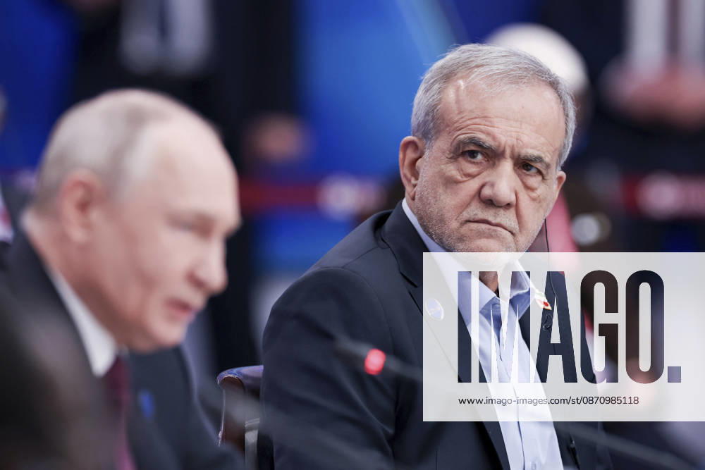 Moscow, Russian Federation: Russian President Vladimir Putin, remarks as Iranian President Masoud Pezeshkian, right, looks on during a plenary session of the 8th summit of the Gas Exporting Countries Forum, October 27, 2026 in Moscow, Russia. Moscow Russian Federation - ZUMAp138 20261027_zaa_p138_022