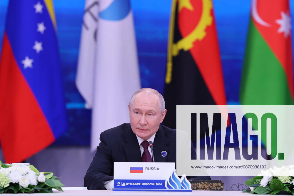 Russian President Vladimir Putin speaks into a microphone behind a Russia nameplate at the eighth Gas Exporting Countries Forum summit in Moscow, Russia, on October 27, 2026. Putin chaired the eighth summit of the Gas Exporting Countries Forum (GECF), which brought together heads of delegations for talks on natural gas markets and global energy security. Moscow Russia - ZUMAi98_ 20261027_zih_i98_014