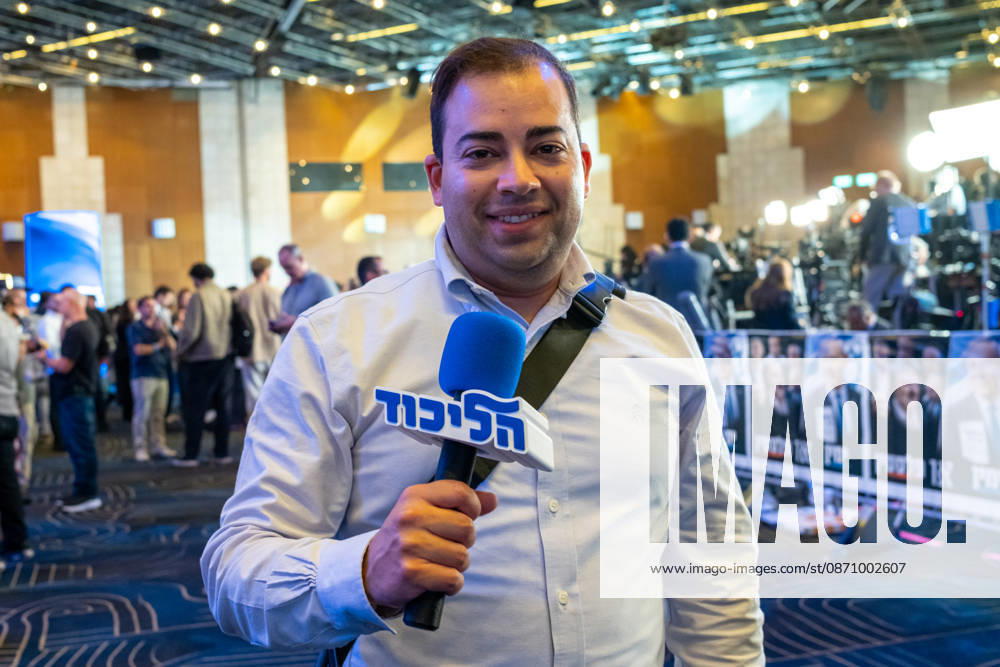 Israel, Jerusalem, October 27–28, 2026: Scenes from the election party of the Likud Party led by incumbent Prime Minister Benjamin Netanyahu. There was a long wait before Bibi took the stage, who didn’t take the stage until around 3:15 a.m. A Likud reporter holding a cube-shaped microphone with a 3D design, bearing the word Likud