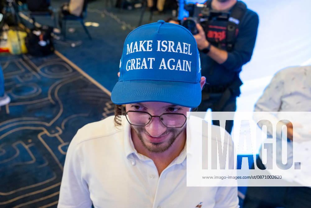 Israel, Jerusalem, October 27–28, 2026: Scenes from the election rally of the Likud Party led by incumbent Prime Minister Benjamin Netanyahu. There was a long wait for Bibi to appear; he didn’t take the stage until around 3:15 a.m. Baseball caps bearing the slogan Make Israel Great Again were handed out at the event.