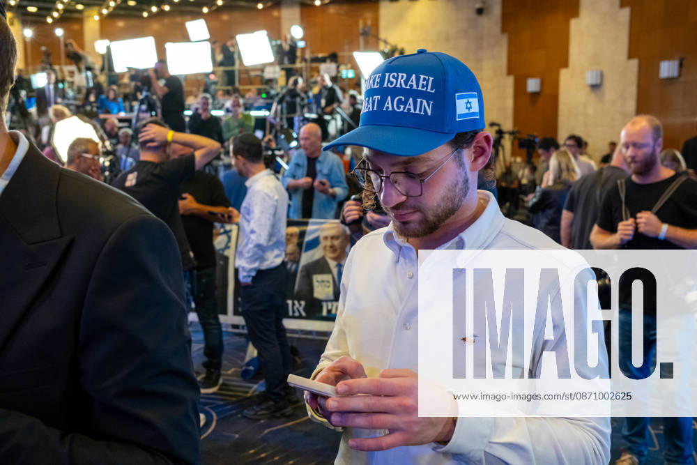 Israel, Jerusalem, October 27–28, 2026: Scenes from the election rally of the Likud Party led by incumbent Prime Minister Benjamin Netanyahu. There was a long wait for Bibi to appear; he didn’t take the stage until around 3:15 a.m. Baseball caps bearing the slogan Make Israel Great Again were handed out at the event.
