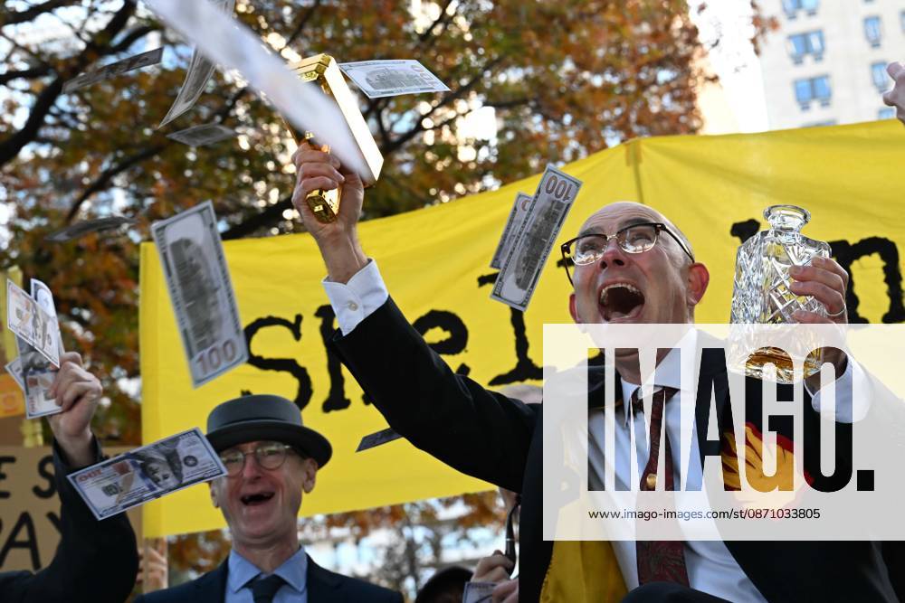 Climate activists hold demonstration in London LONDON, UNITED KINGDOM - OCTOBER 28: Climate activists stage a protest near the headquarters of energy company Shell, following a call by environmental group Fossil Free London, in London, United Kingdom, on October 28, 2026. During the demonstration, activists dressed as executives take part in a theatrical performance, throwing fake banknotes into the air and displaying banners criticizing the company s profits and fossil fuel activities. Rasid Necati Aslim Anadolu London United Kingdom. Editorial use only. Please get in touch for any other usage.