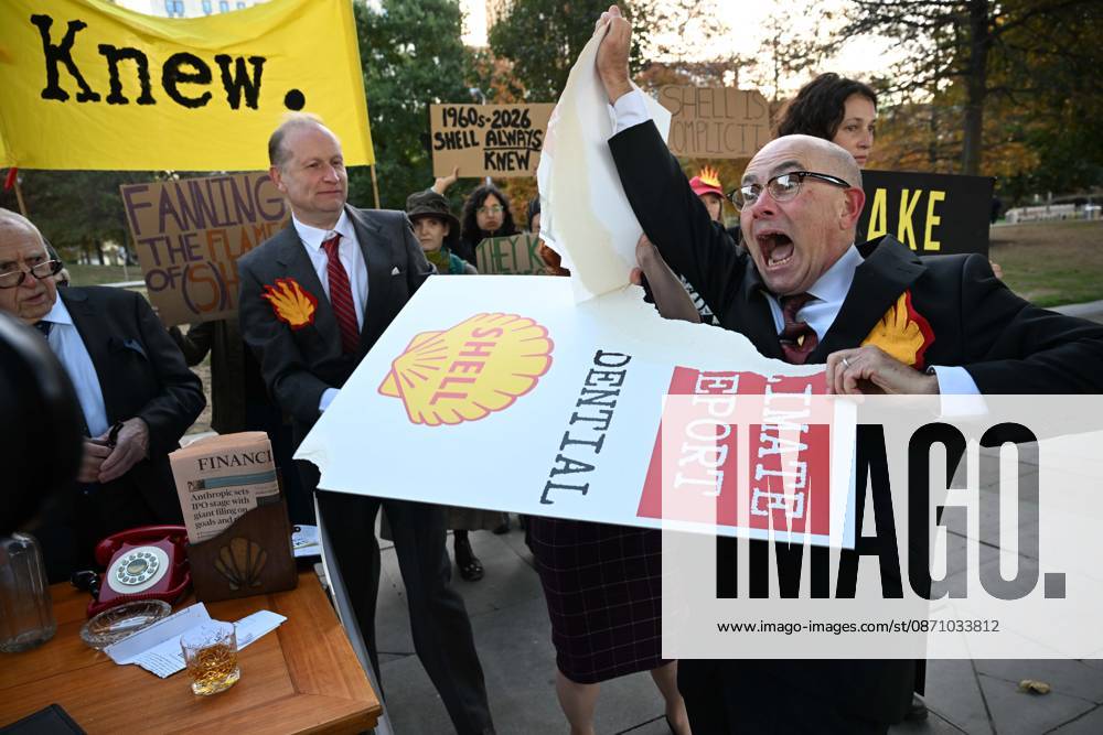 Climate activists hold demonstration in London LONDON, UNITED KINGDOM - OCTOBER 28: Climate activists stage a protest near the headquarters of energy company Shell, following a call by environmental group Fossil Free London, in London, United Kingdom, on October 28, 2026. During the demonstration, activists dressed as executives take part in a theatrical performance, throwing fake banknotes into the air and displaying banners criticizing the company s profits and fossil fuel activities. Rasid Necati Aslim Anadolu London United Kingdom. Editorial use only. Please get in touch for any other usage.