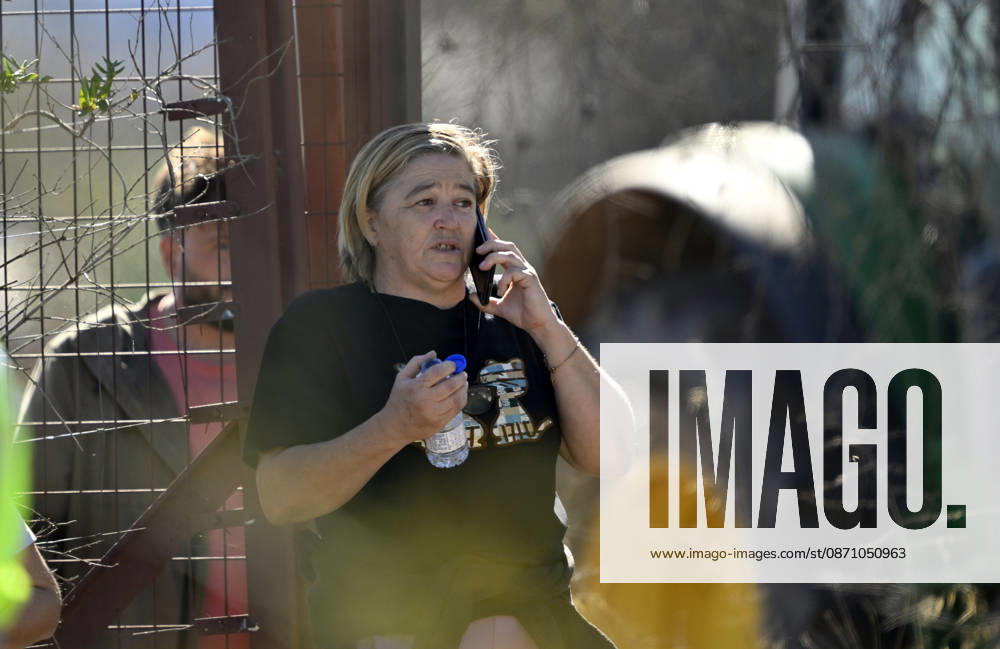 Death toll in Spain high-speed train collision climbs to 46 TOLEDO, SPAIN - OCTOBER 28: A woman speaks on her mobile phone near the scene of a collision involving two high-speed trains in Toledo province, Spain, on October 28, 2026. At least 46 people were killed and many others injured in the collision, according to Spanish media reports. Emergency crews continue rescue operations as authorities investigate the cause of the accident.Referans ekle Burak Akbulut Anadolu Toledo Spain. Editorial use only. Please get in touch for any other usage.