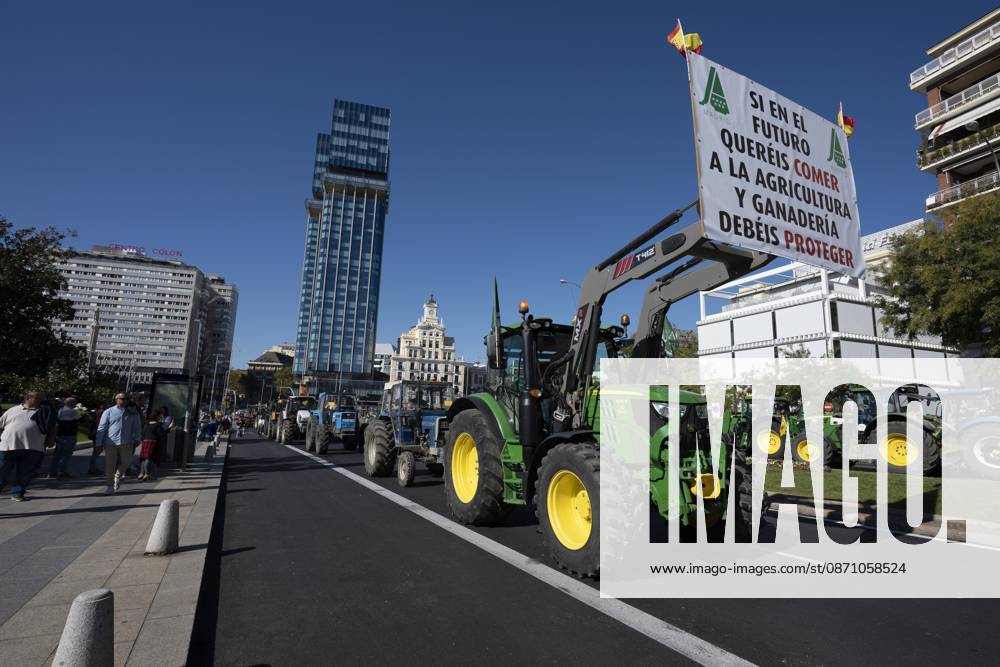 Tractors leaving the capital after the tractor protest was called off following the rail accident, in Madrid, Spain..Around 500 tractors, accompanied by thousands of farmers and livestock breeders from across Spain, organised by Asaja, COAG and Union de Uniones, have taken to the streets of Madrid to demand urgent measures to ensure the profitability of farms and the future of the countryside. Madrid Spain - ZUMAs197 20261028_aaa_s197_046