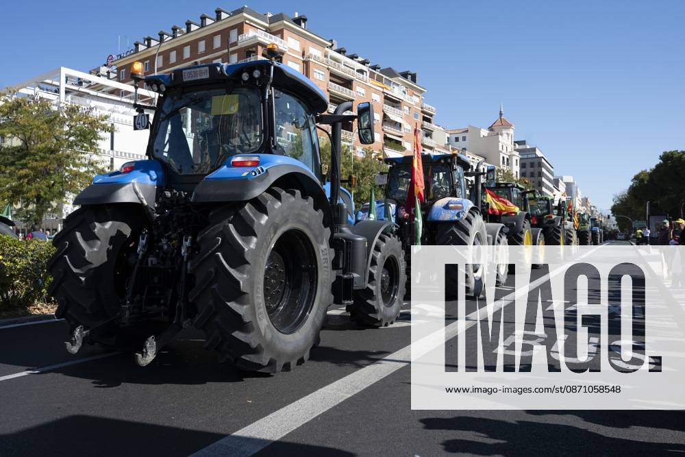 Tractors leaving the capital after the tractor protest was called off following the rail accident, in Madrid, Spain..Around 500 tractors, accompanied by thousands of farmers and livestock breeders from across Spain, organised by Asaja, COAG and Union de Uniones, have taken to the streets of Madrid to demand urgent measures to ensure the profitability of farms and the future of the countryside. Madrid Spain - ZUMAs197 20261028_aaa_s197_049