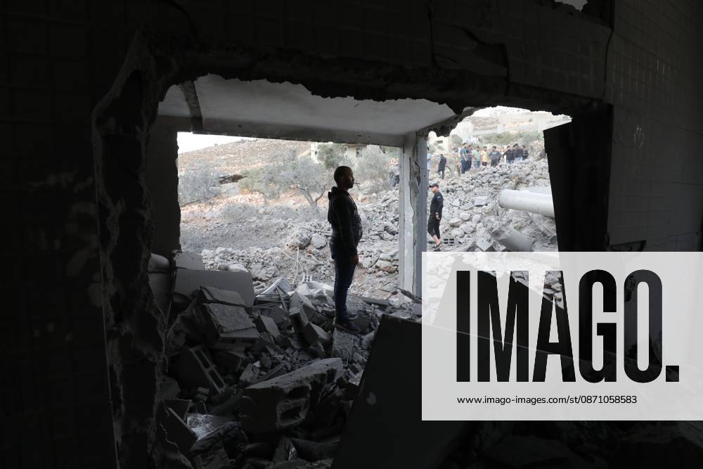 Nablus, Palestine, State of: NABLUS, PALESTINE - OCTOBER 28, 2026: Palestinians inspect the aftermath of the destruction at the home of prisoner Ibrahim Daoud, following its demolition in Beita village , south of Nablus in the West Bank, on Oct 28,2026. Nablus Palestine, State of - ZUMAq101 20261028_zna_q101_049