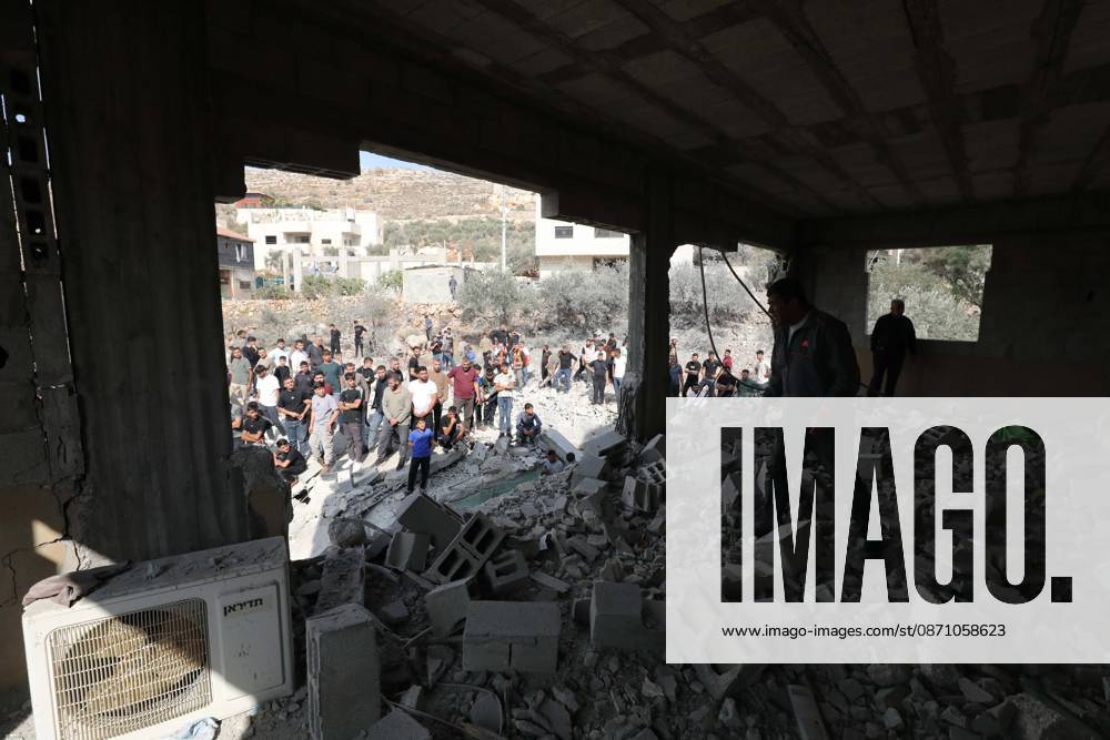 Nablus, Palestine, State of: NABLUS, PALESTINE - OCTOBER 28, 2026: Palestinians inspect the aftermath of the destruction at the home of prisoner Ibrahim Daoud, following its demolition in Beita village , south of Nablus in the West Bank, on Oct 28,2026. Nablus Palestine, State of - ZUMAq101 20261028_zna_q101_047