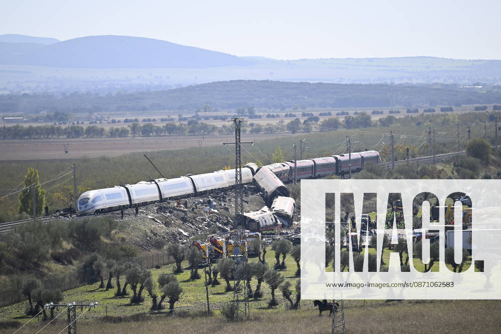 At least 64 dead, 80 injured in high-speed train crash in central Spain TOLEDO, SPAIN - OCTOBER 28: Emergency teams work at the scene of a collision involving two high-speed trains near Urda station in Toledo province, Spain, on October 28, 2026. The death toll has risen to 64, according to Spanish media reports. Preliminary information suggests that a Renfe AVE train struck the rear of a stationary Iryo train, causing two carriages to derail and fall down an embankment. Emergency crews continue rescue and response operations as authorities investigate the cause of the collision. Burak Akbulut Anadolu Toledo Spain. Editorial use only. Please get in touch for any other usage.